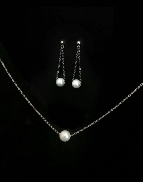 parure Boucle d'oreille perle blanche