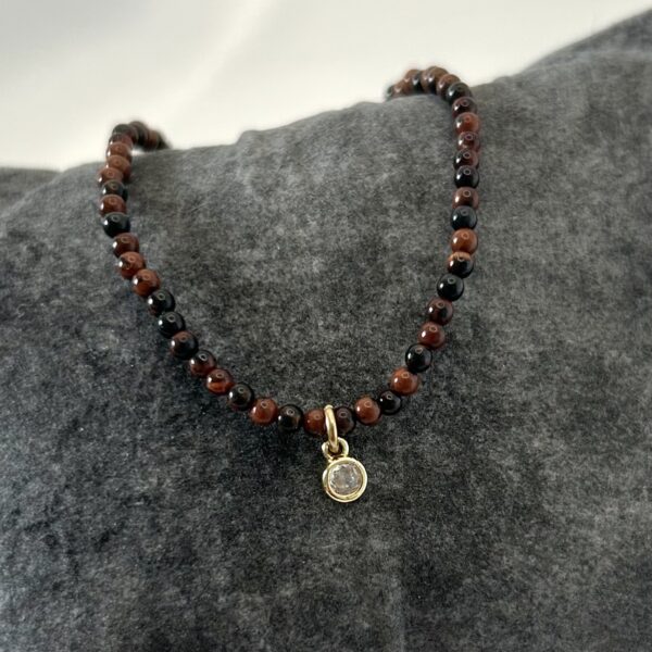 collier œil de tigre Collier perle œil de tigre rouge et pendentif acier